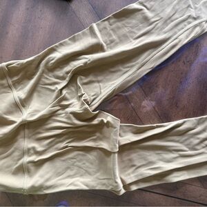 Lulu lemon and Athleta leggings and tank tops sweat shirts sizes 2-4.